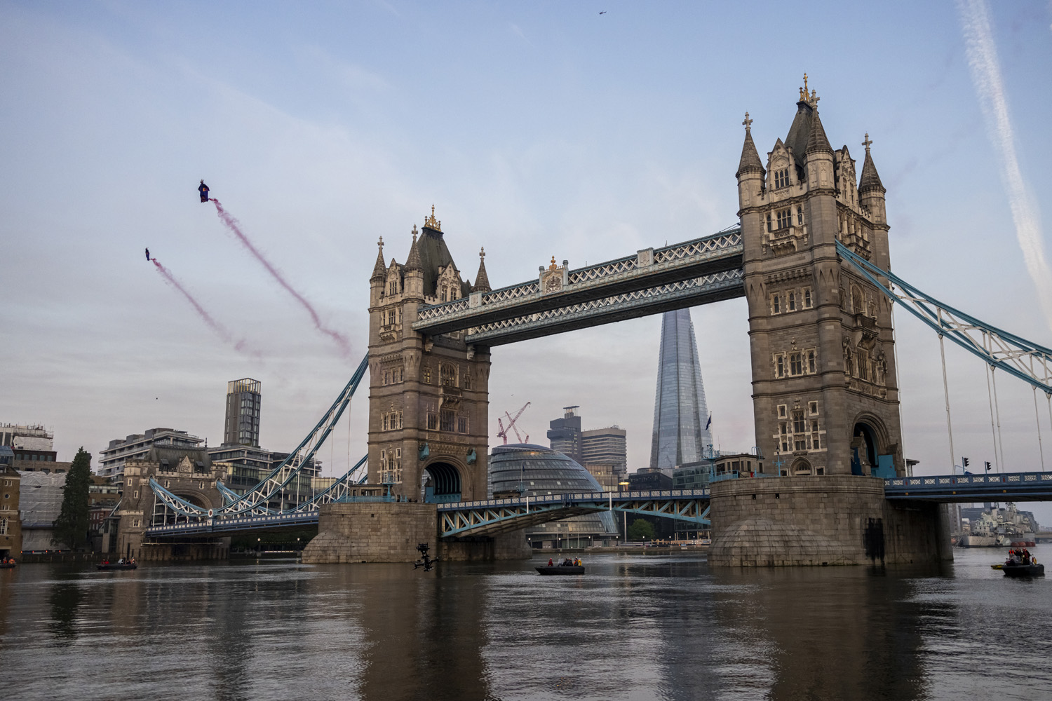 Marco Fuerst and Marco Waltenspiel of Austria fly through Tower Bridge in London, Great Britain on May 12, 2024.