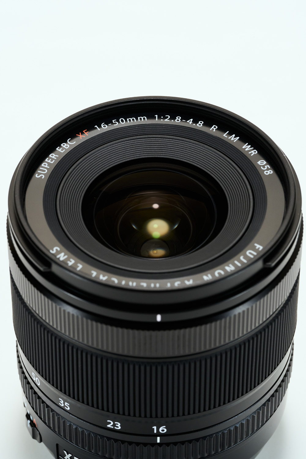 Product shot of Fujinon XF16-50mm lens on white background
