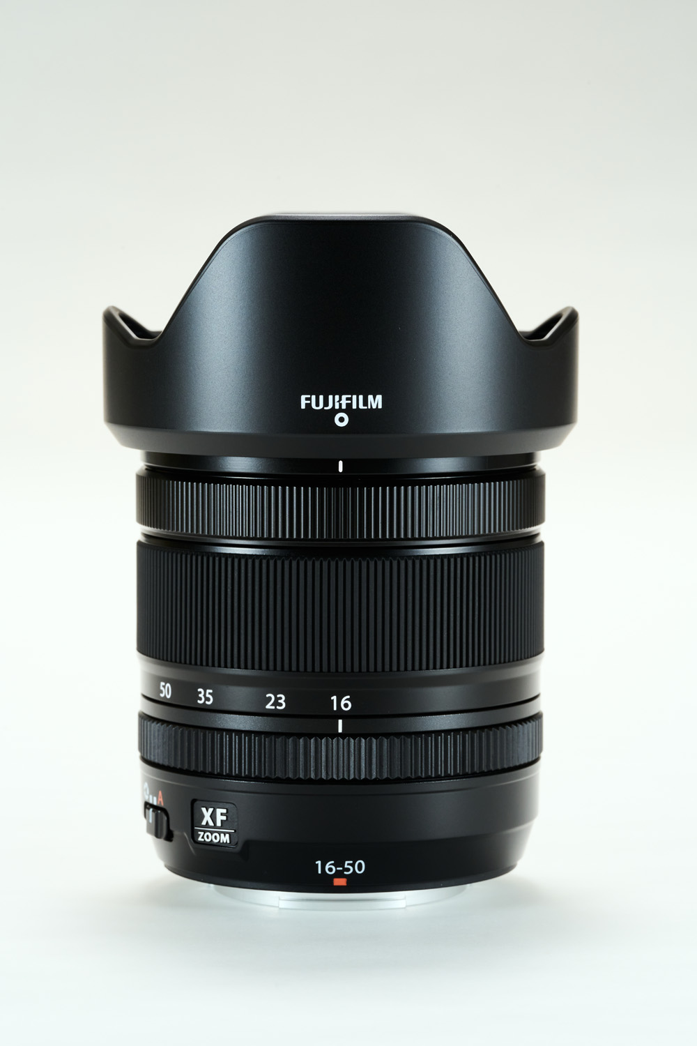 Product shot of Fujinon XF16-50mm lens on white background