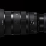Product photo of the 28-45mm f/1.8 DG DN Art lens attached to camera on black background