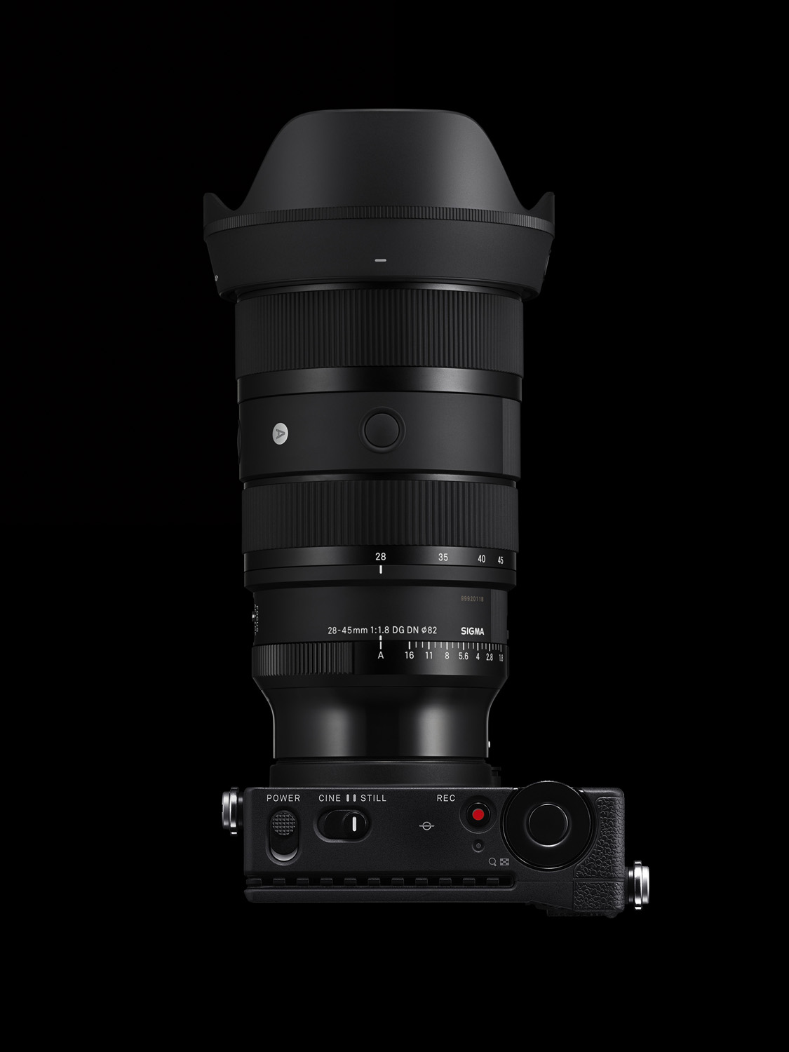 Product photo of the 28-45mm f/1.8 DG DN Art lens attached to camera on black background